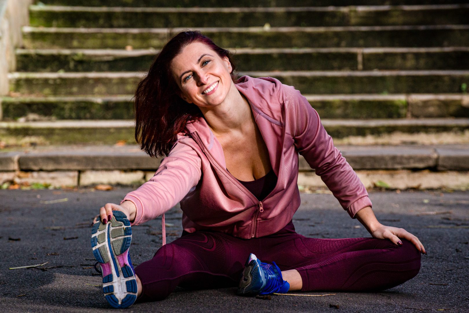 Ania Karbowska stretching outdoors